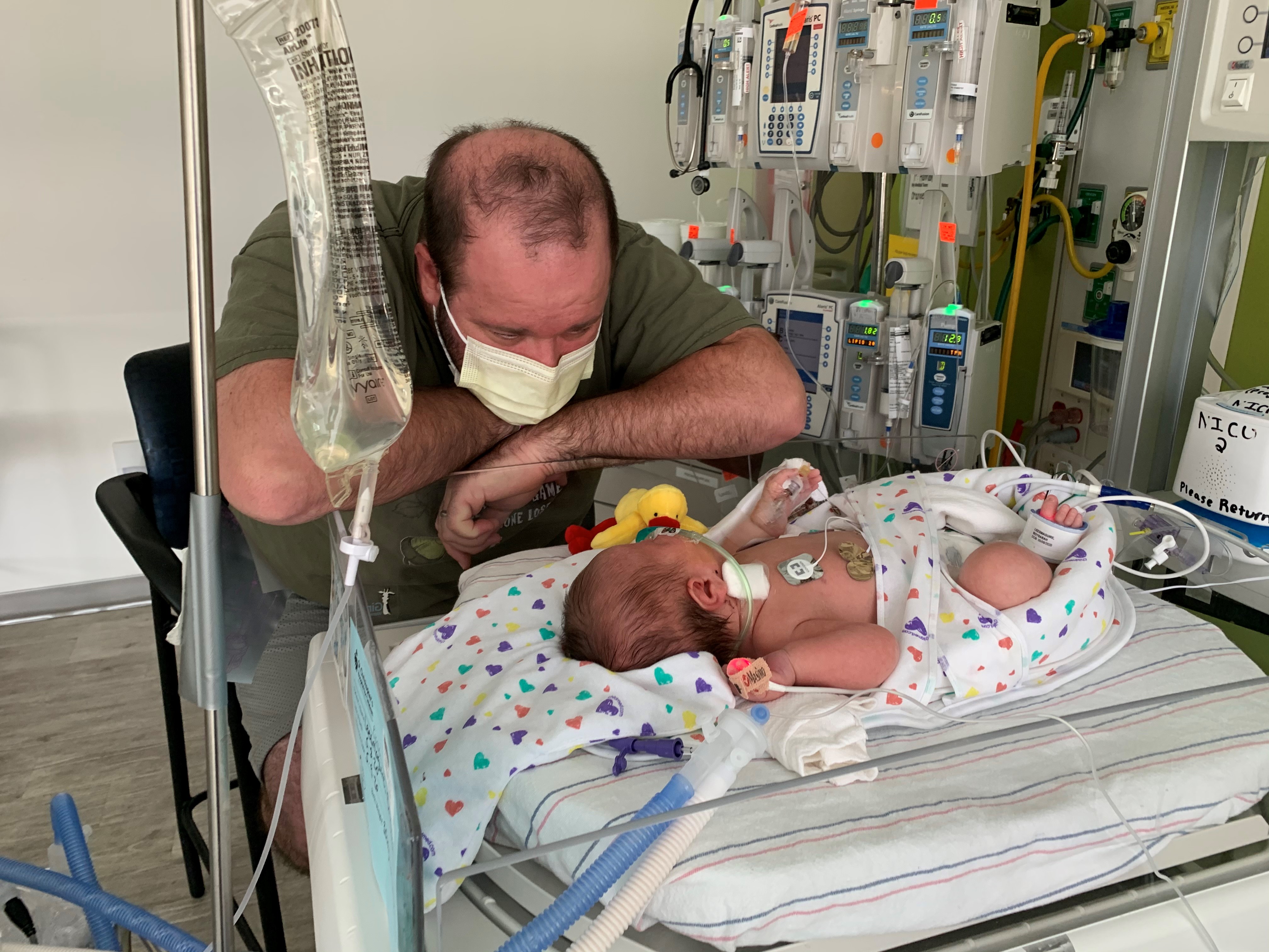 Baby Piece and father in the NICU