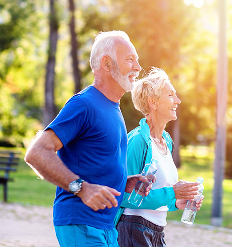 Senior couple jogging