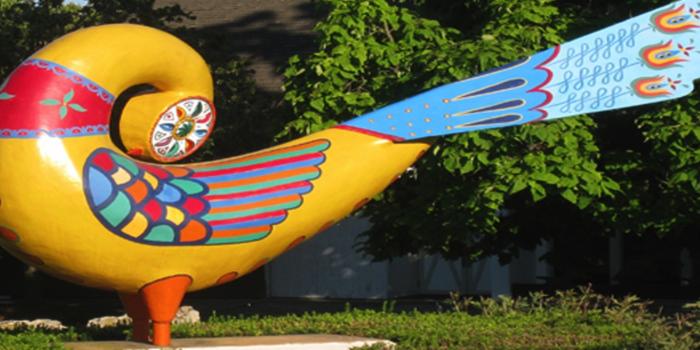 Dutch sculpture of bird.