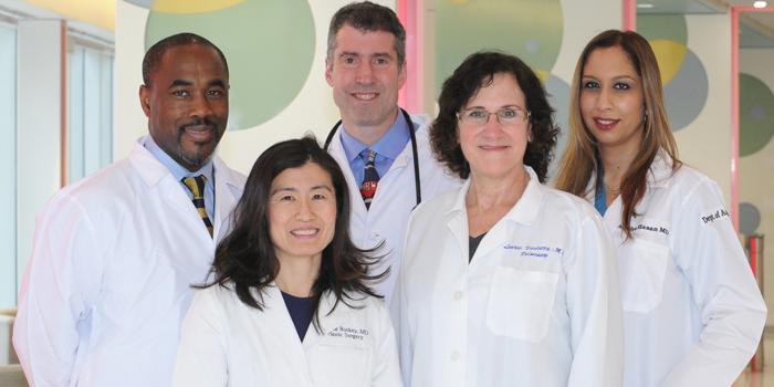 Group of doctors from St. Christopher's Hospital for Children standing in a group