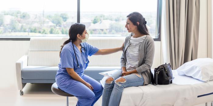 Patient with breast health provider