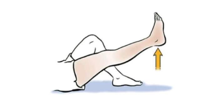 A person's legs are shown while lying on flat surface. One knee is bent and the other lifted straight outward and upward at an angle, both feet flat on surface. Straight leg is slowly lifted and lowered to perform straight leg raises.